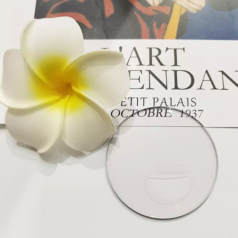 1.499,- Polodokončená plochá bifokální čočka